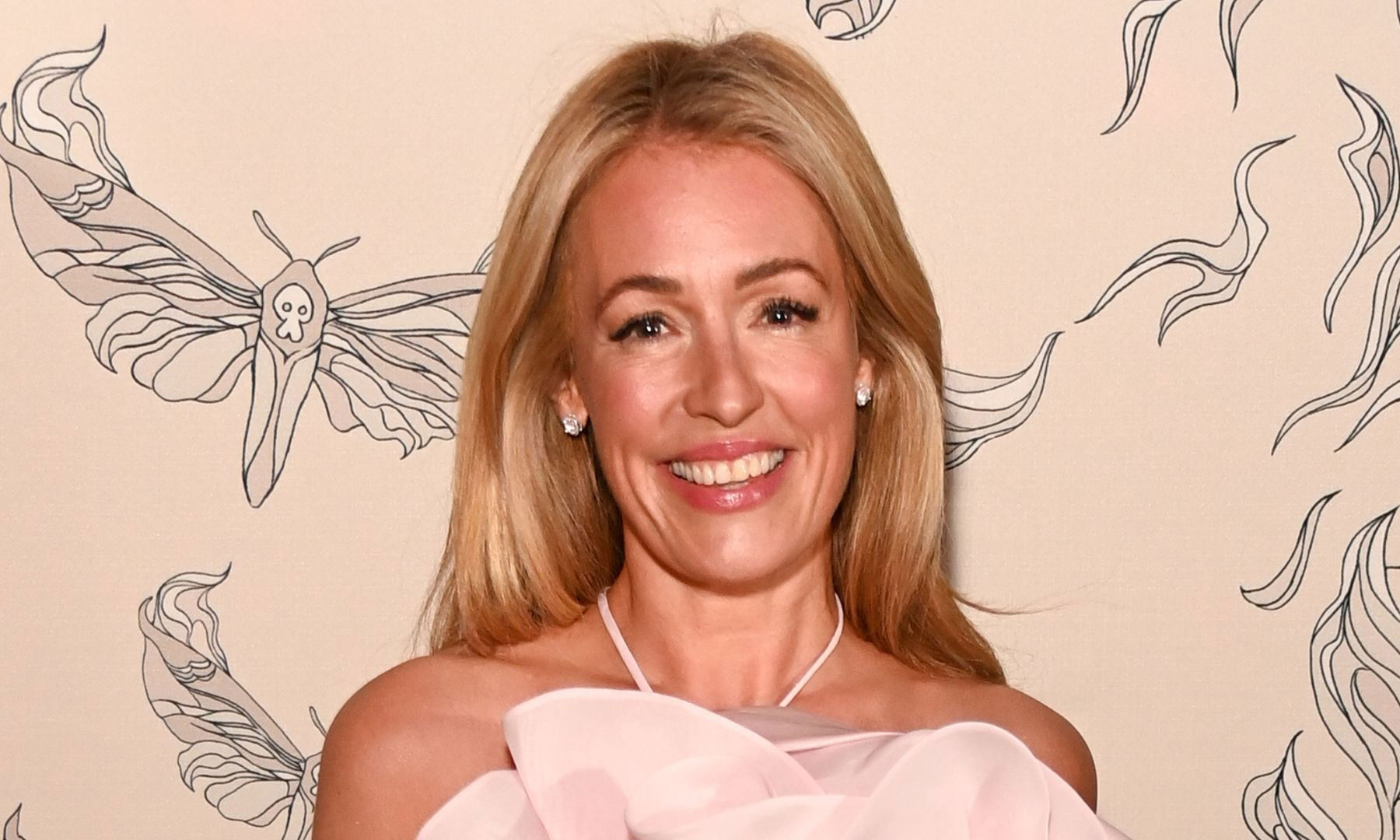 Cat Deeley's Spring Style: The Case For The Cream Pleated Midi Skirt Cat Deeley's Spring Style: The Case For The Cream Pleated Midi Skirt