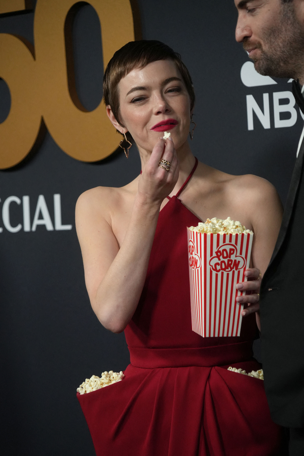 Emma Stone's Popcorn Butt Lift Dress: SNL Red Carpet Look Sparks Online Frenzy Emma Stone's Popcorn Butt Lift Dress: SNL Red Carpet Look Sparks Online Frenzy