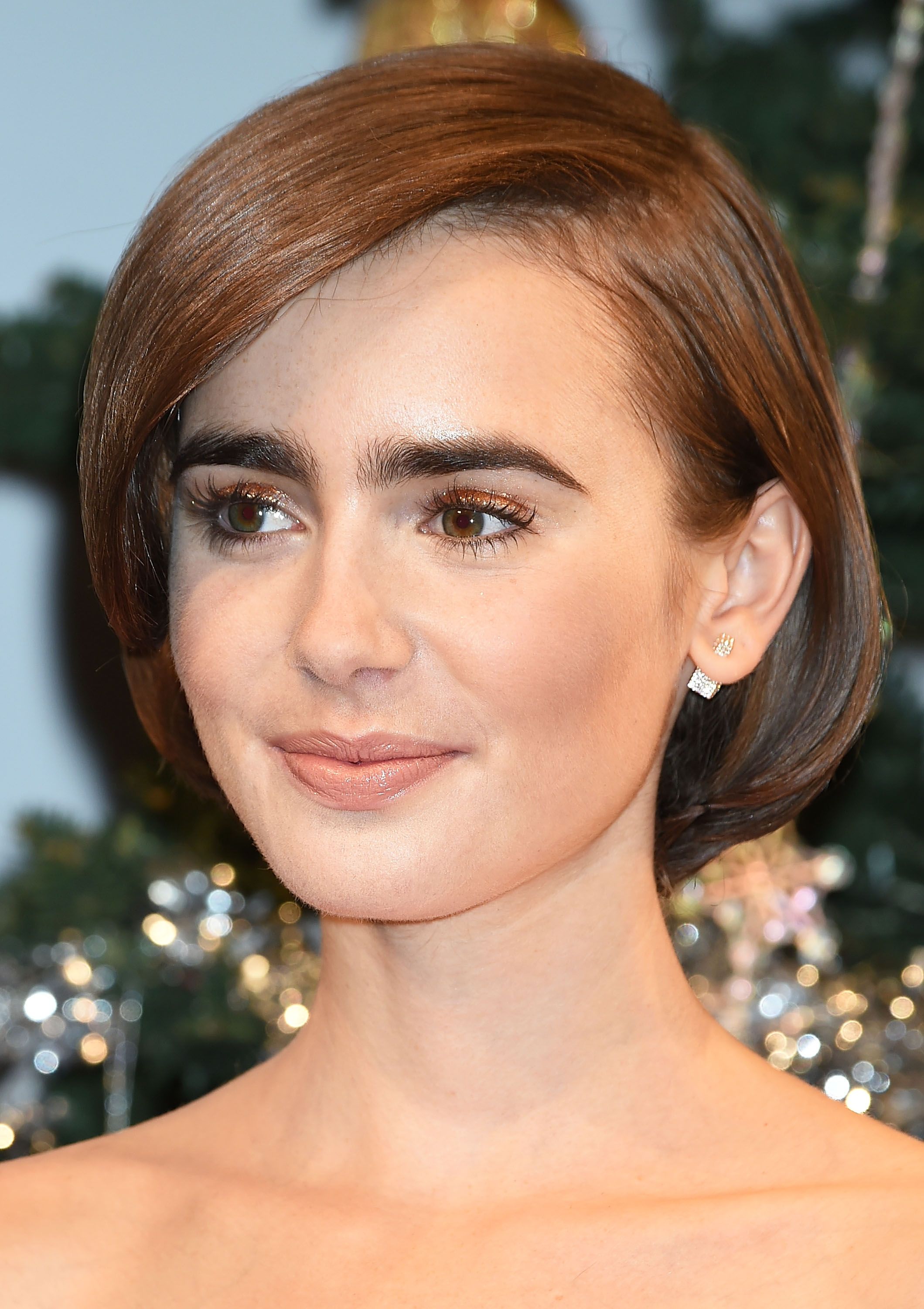 Lily Collins' Effortless Beauty: Bob Hairstyle, Full Brows, And Nude Lip Trend Lily Collins' Effortless Beauty: Bob Hairstyle, Full Brows, And Nude Lip Trend