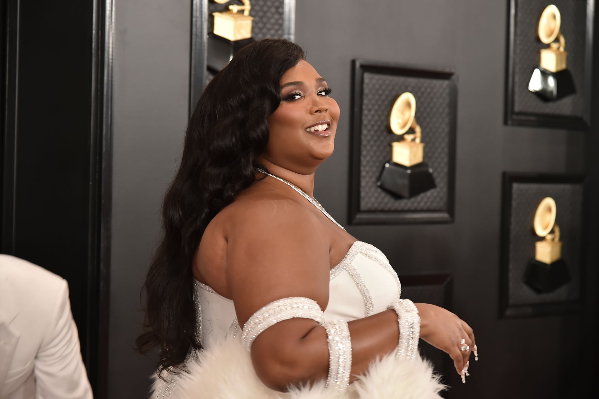 Lizzo's Trainer Defends Her Fitness Journey Lizzo's Trainer Defends Her Fitness Journey