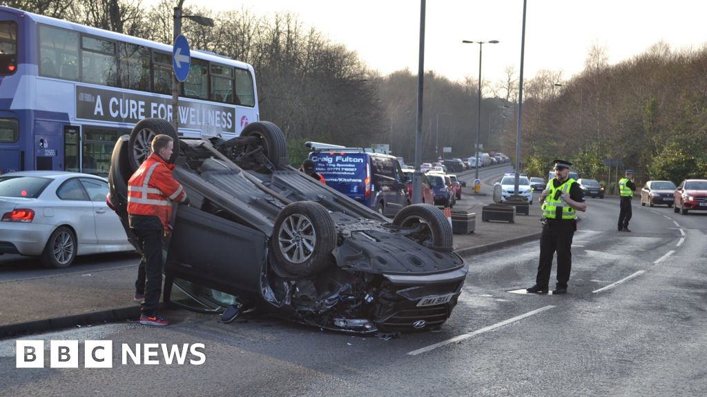 M56 Car Crash: Overturned Vehicle, Casualty Treated On Motorway M56 Car Crash: Overturned Vehicle, Casualty Treated On Motorway
