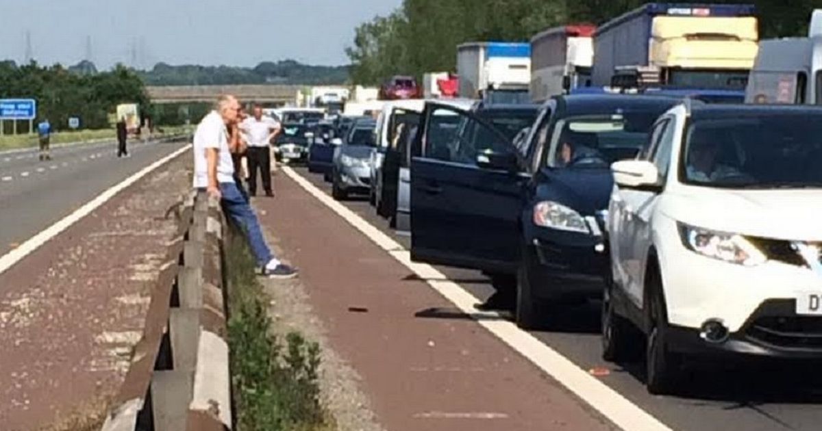 M56 Motorway Incident: Overturned Car, Paramedic Response M56 Motorway Incident: Overturned Car, Paramedic Response