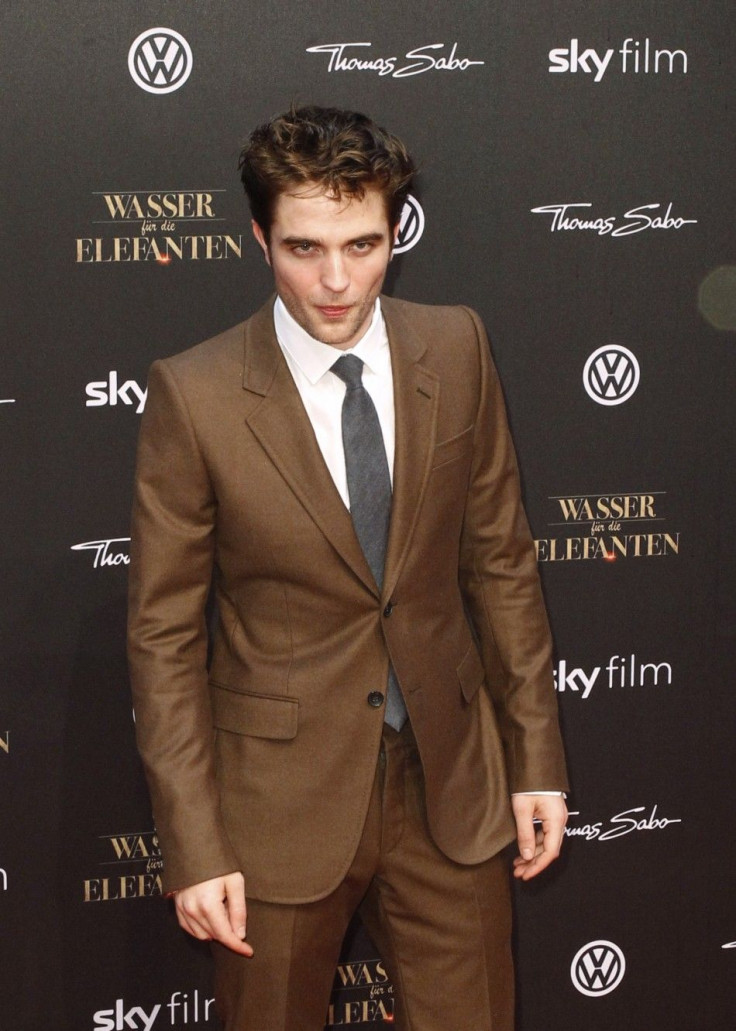 Robert Pattinson: A Dad's Guide To Diaper Changing Robert Pattinson: A Dad's Guide To Diaper Changing